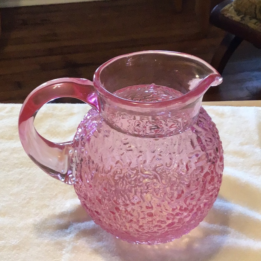 Pink glass pitcher.